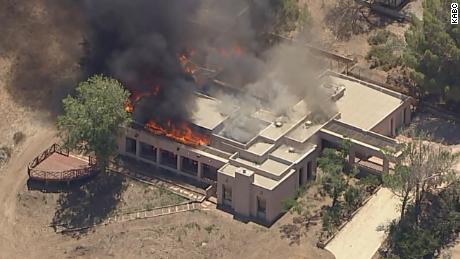 A house fire is believed to be connected with the shooting at a Los Angeles County Fire Station in Agua Dulce.