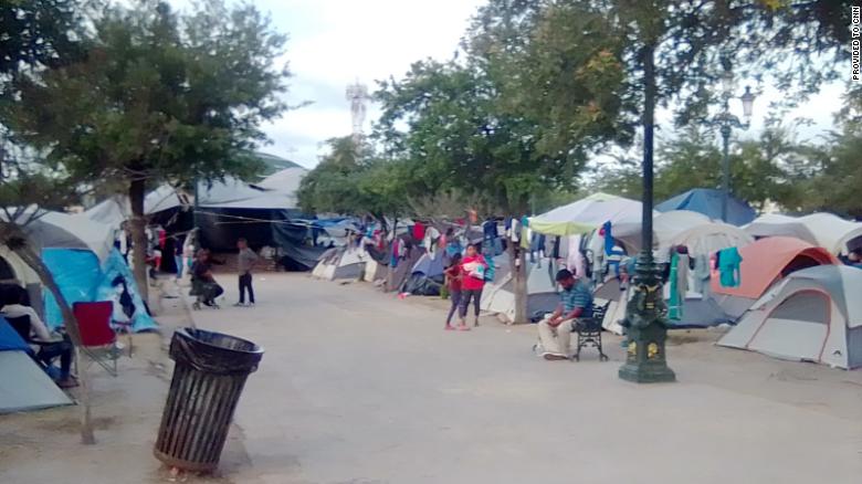 A tent city has been erected by migrants in a public park in Reynosa, Mexico. The trees in the park are connected by clothes lines as migrants, mostly from Central America, make the park their home