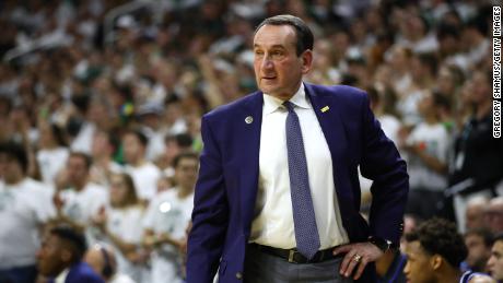 Head coach Mike Krzyzewski of the Duke Blue Devils reacts from the bench while playing the Michigan State Spartans at the Breslin Center on December 3, 2019, in East Lansing, Michigan. 