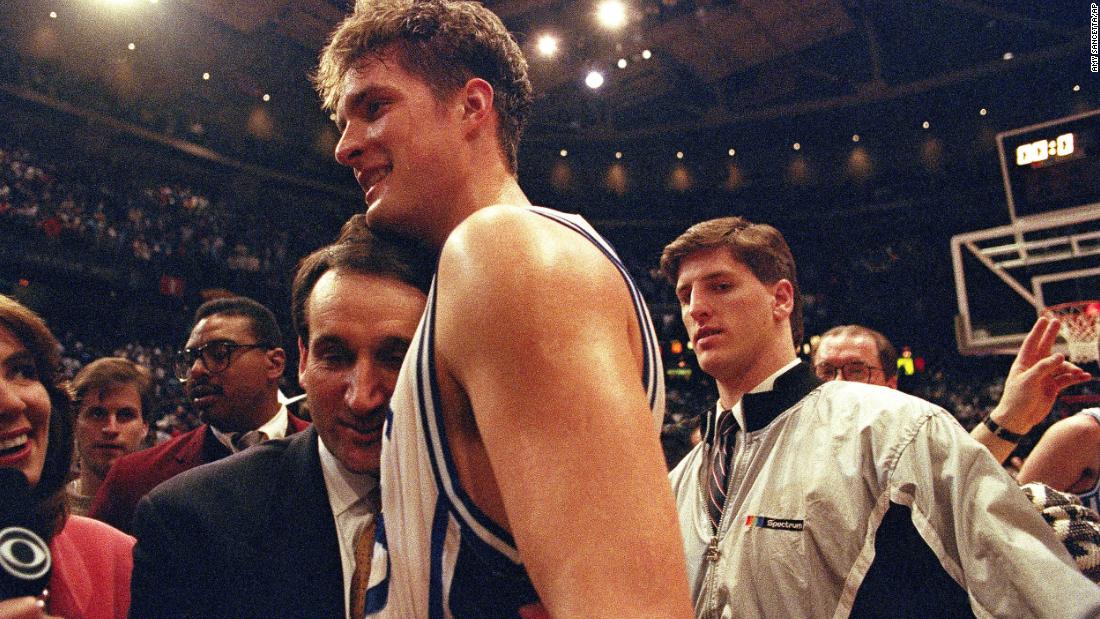 Krzyzewski hugs his star center, Christian Laettner, after Laettner&#39;s buzzer-beater over Kentucky put the Blue Devils in the 1992 Final Four. Duke went on to repeat as champions.