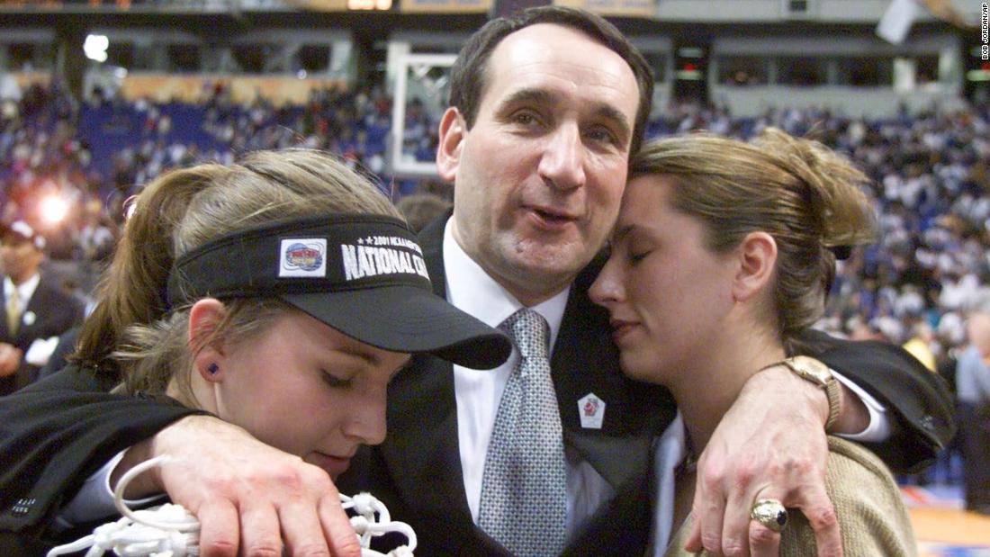 Krzyzewski celebrates with his daughters Jamie, left, and Lindy after Duke won its third national championship in 2001.