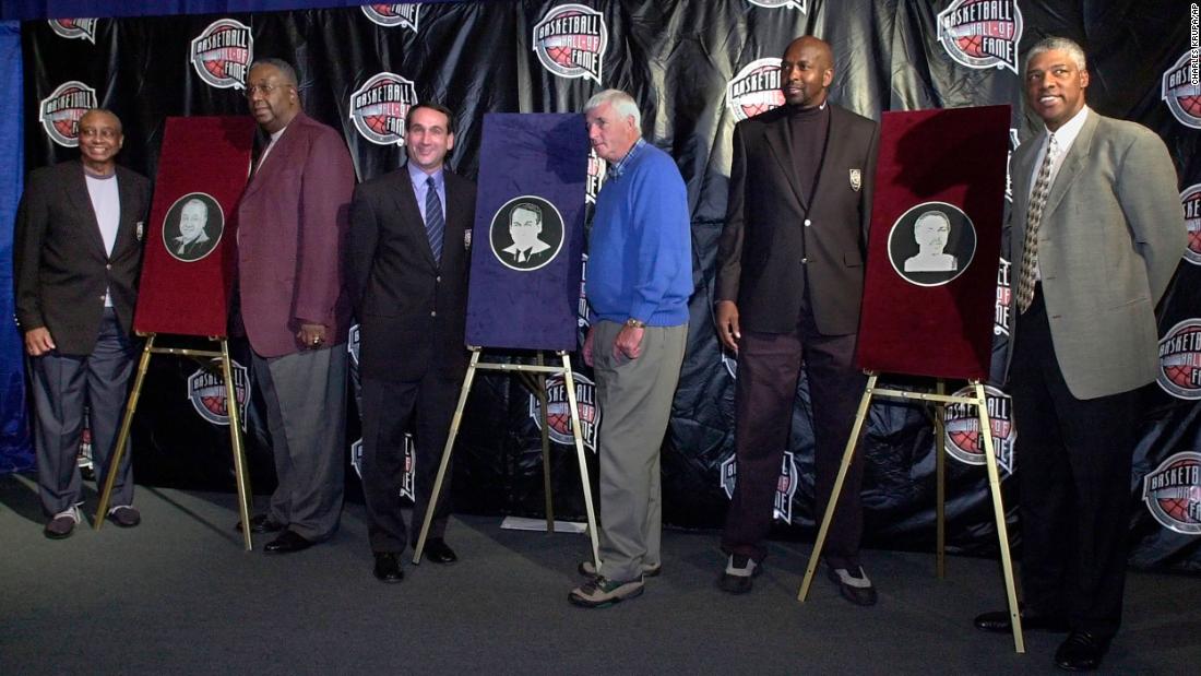 In 2001, Krzyzewski was inducted into the Basketball Hall of Fame. He was joined by his old coach Bob Knight, who introduced him during the ceremony. Other inductees that year were John Chaney, far left, and Moses Malone, second from right.