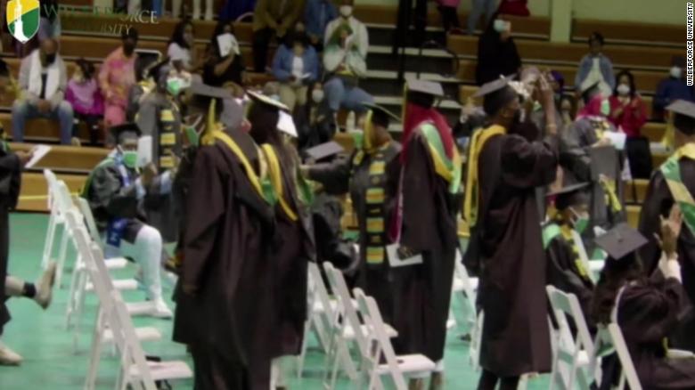 Grads celebrate as university president announces their debt forgiven