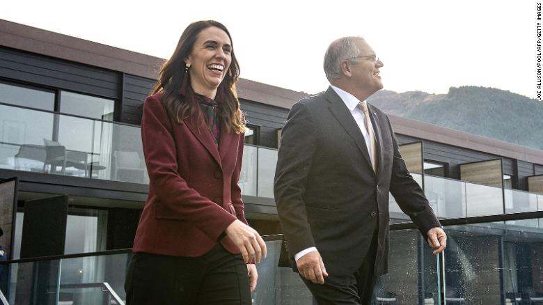 New Zealand's Prime Minister Jacinda Ardern walks with Australia's Prime Minister Scott Morrison ahead of the Australia-New Zealand Leaders' Meeting in Queenstown on May 31, 2021.