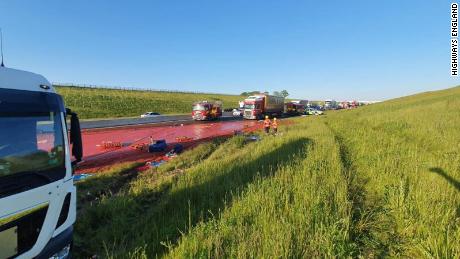 A truck carrying tomato puree crashed in England on Tuesday, spilling its contents and turning the road red.