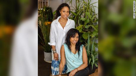 Marva Babel, standing, owns Ode to Babel in Brooklyn, New York, along with her sister Myriam, seated.