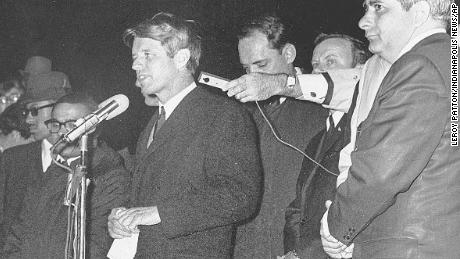 Robert F. Kennedy, shown in this April 4, 1968, file photo, as he speaks to an Indianapolis crowd telling them of the assassination of Martin Luther King Jr.   