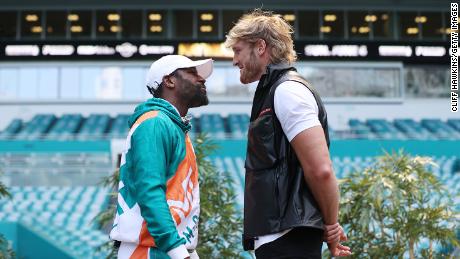 Floyd Mayweather and Logan Paul face off during media availability prior to their June 6 match in Miami Gardens, Florida. 