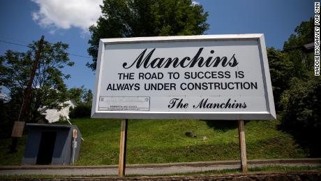 A sign bearing the Manchin name appears in Farmington.