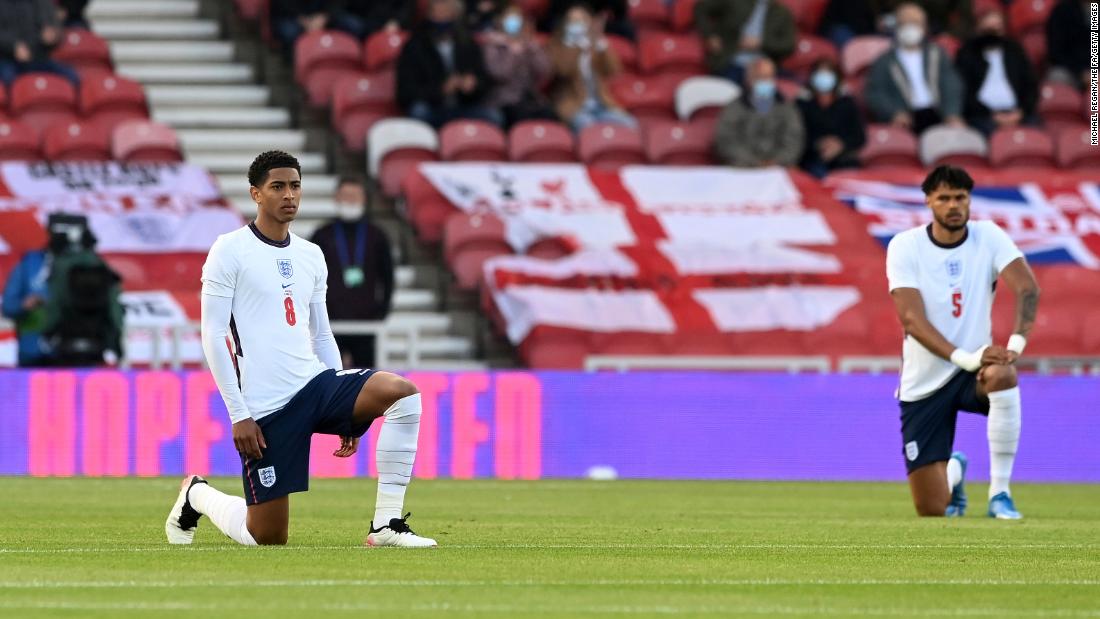 Euro 2020: Football's coming home, but taking a knee divides England fans