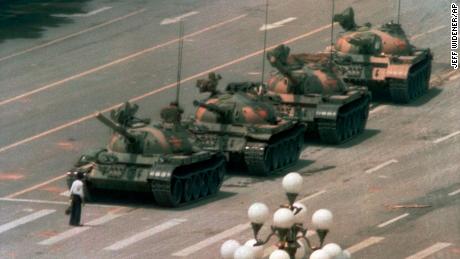 In this 1989 photo, a man stands alone to block a line of tanks heading east on Beijing&#39;s Cangan Blvd. in Tiananmen Square.