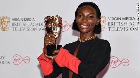 Michaela Coel poses for photographers with his Leading Actress award for her role in &#39;I May Destroy You&#39; backstage at the British Academy Television Awards in London, Sunday, June 6, 2021. (AP Photo/Alberto Pezzali)