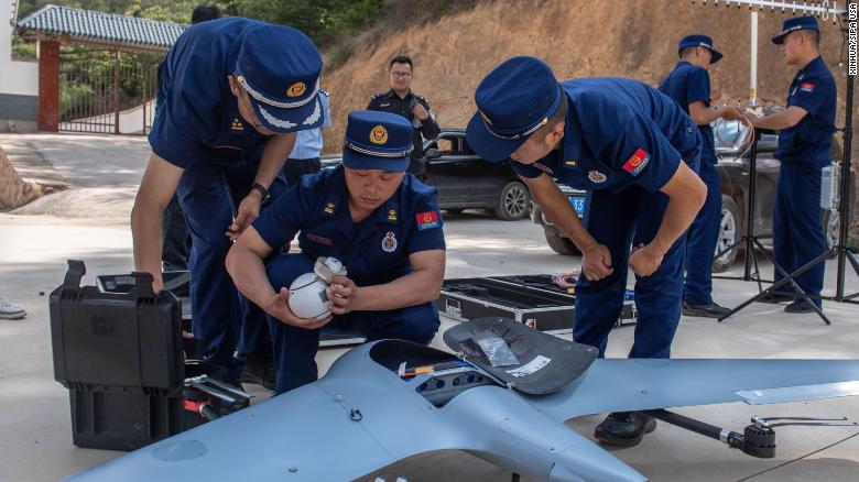 Workers prepare a drone to monitor the migrating wild Asian elephants in Eshan County, Yuxi City, southwest China&#39;s Yunnan Province on May 29.