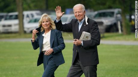 US President Joe Biden and First Lady Jill Biden make their way to board Marine One before departing from The Ellipse, near the White House, in Washington, DC on June 9, 2021. 
