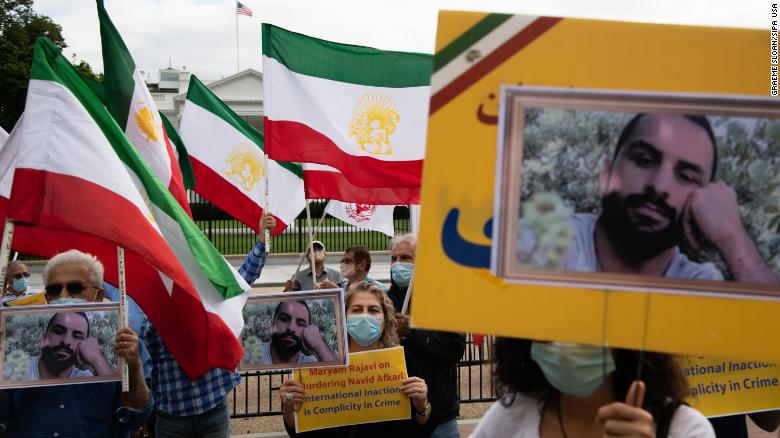 Iranian-American supporters of the National Council of Resistance of Iran (NCRI) protest the execution of wrestler Navid Afkari by Iran, in front of the White House in Washington, D.C. in September 2020. 