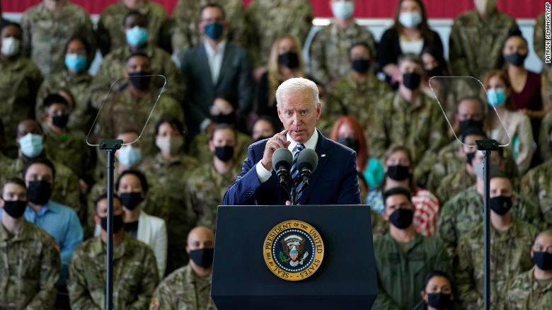 President Joe Biden speaks to American service members at RAF Mildenhall in Suffolk, England, Wednesday, June 9, 2021.