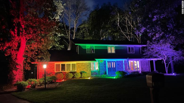 A Wisconsin couple couldn’t fly their Pride flag, so they lit up their home like a rainbow