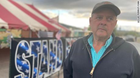 Local farmer Dan Nielsen stands outside the tent set up next to the main headgate called &quot;A&quot; Canal in Klamath Falls, Oregon.