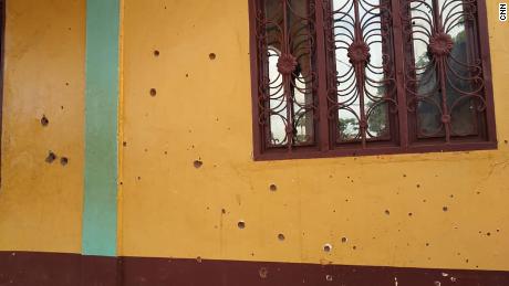 Bullet holes are seen in an exterior wall of the al Taqwa mosque in Bambari, Central African Republic, in a photo taken in May 2021.