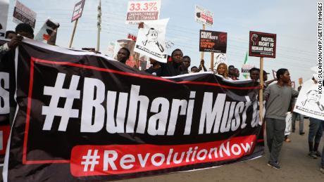 Nigeria&#39;s president vows to fight militant groups and fix economy as activists call for anti-government protests