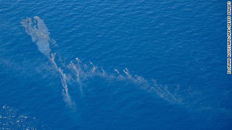 This handout picture, taken and released on June 12 by the French Air Force, shows an oil spill approaching eastern Corsica which appears to have leaked from a ship.