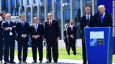 From left: Dutch Prime Minister Mark Rutte, Montenegro&#39;s Prime Minister Dusko Markovic, Slovenian Prime Minister Miro Cerar, Danish Prime Minister Lars Lokke Rasmussen, Turkish President Recep Tayyip Erdogan, and NATO Secretary General Jens Stoltenberg listen to US President Donald Trump&#39;s speech during the unveiling ceremony of the Berlin Wall monument, during the NATO summit in Brussels on May 25, 2017.