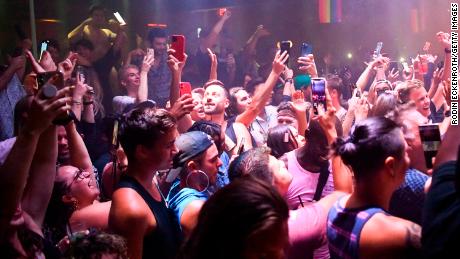 Patrons cheer during a &quot;Countdown To Reopening&quot; party at The Abbey on June 15, 2021, in West Hollywood, California. 
