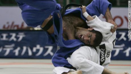 Iran&#39;s Vahid Sarlak duels with Spain&#39;s Javier Fernandez in the up to and including 60 kgs men&#39;s open category during the World Judo Championships in Cairo in September 2005. Sarlak says he was forced to default from the tournament after he&#39;d been drawn against an opponent from Israel. 