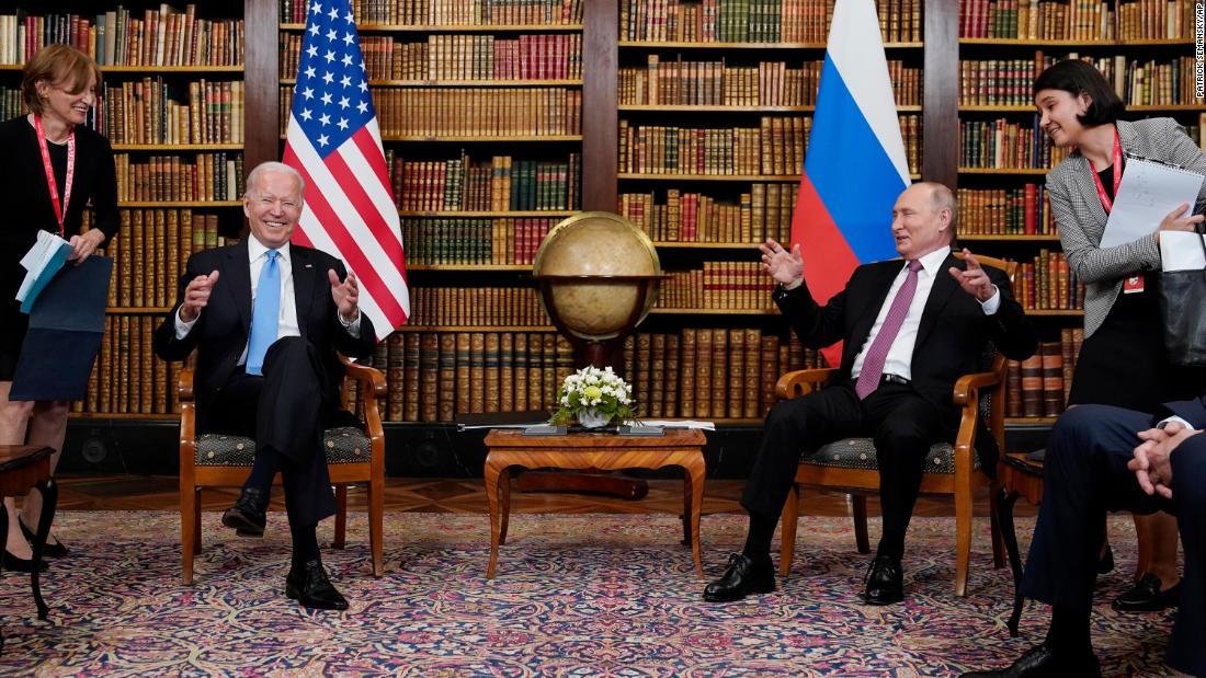 Watch 'awkward' photo op between Biden and Putin