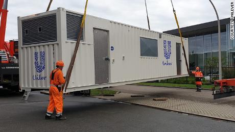 Unilever&#39;s latest factory getting into position in Wageningen, Netherlands. Unilever is developing a fully functioning production line inside a 40-foot shipping container. 