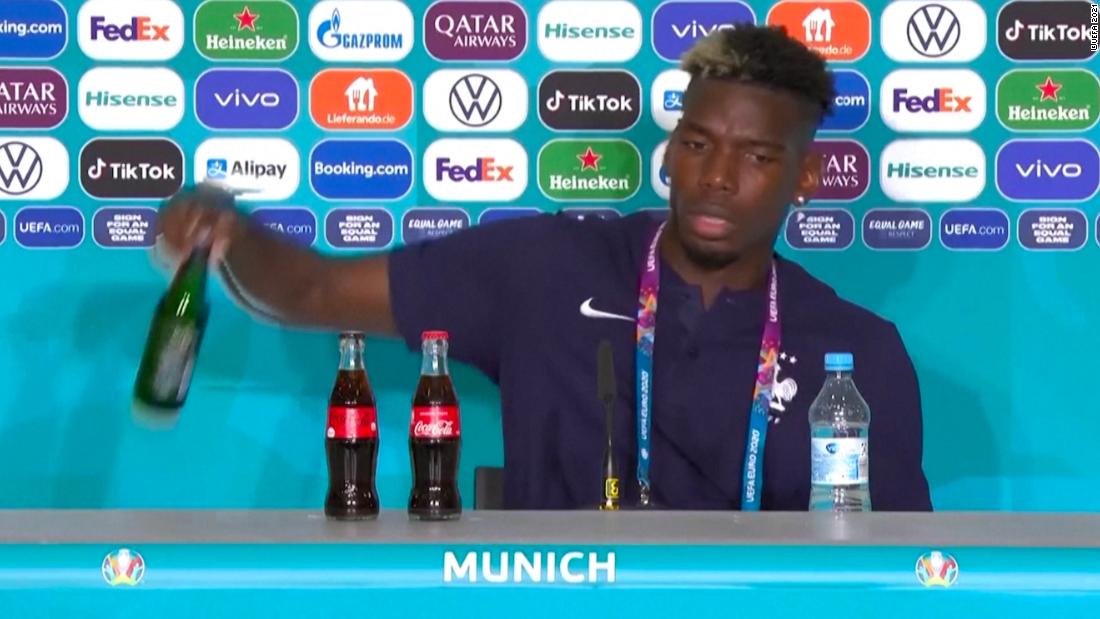 Paul Pogba follows Cristiano Ronaldo's lead by removing display drink during a press conference