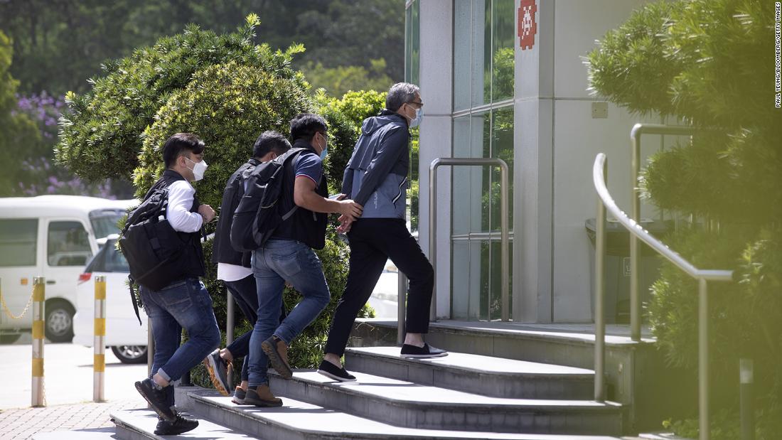 Hong Kong police arrest Apple Daily editors and executives under national security law