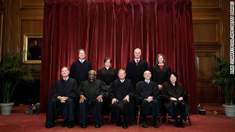 Seated from left: Associate Justice Samuel Alito, Associate Justice Clarence Thomas, Chief Justice John Roberts, Associate Justice Stephen Breyer and Associate Justice Sonia Sotomayor, standing from left: Associate Justice Brett Kavanaugh, Associate Justice Elena Kagan, Associate Justice Neil Gorsuch and Associate Justice Amy Coney Barrett pose during a group photo of the Justices at the Supreme Court in Washington, DC on April 23, 2021. (Photo by Erin Schaff / POOL / AFP) (Photo by ERIN SCHAFF/POOL/AFP via Getty Images)