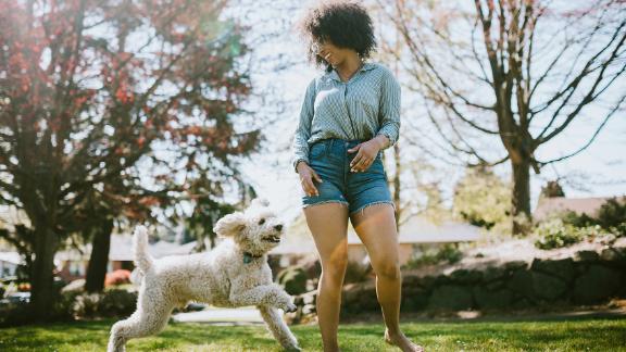 Woman wearing denim shorts in park