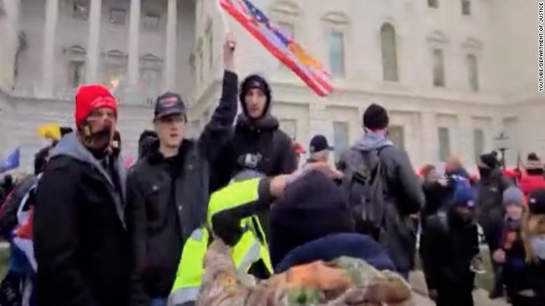 New video shows police getting punched during Capitol riot