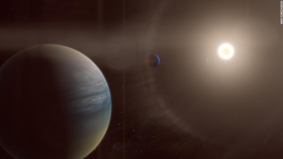 In this artist&#39;s illustration, two gaseous exoplanets can be seen orbiting the bright sun-like star HD 152843. 