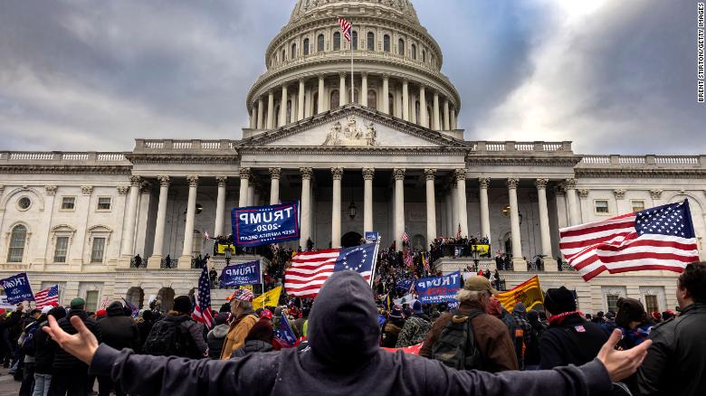 US Capitol riots: Why Garland and DOJ haven't charged anyone with ...