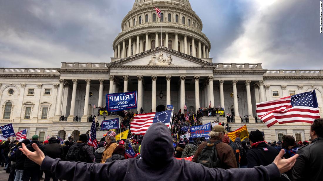 New videos show Capitol rioters attacking police line from officers' point of view