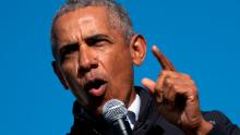 FLINT, MI - OCTOBER 31: Former U.S. President Barack Obama speaks during a drive-in campaign rally for Democratic presidential nominee Joe Biden at Northwestern High School on October 31, 2020 in Flint, Michigan. Biden is campaigning with former President Obama on Saturday in Michigan, a battleground state that President Donald Trump narrowly won in 2016. (Photo by Drew Angerer/Getty Images)