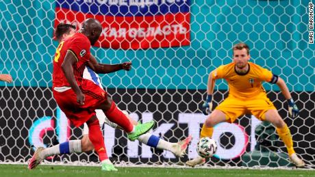 Belgium&#39;s Romelu Lukaku scores his side&#39;s second goal in their 2-0 win against Finland.