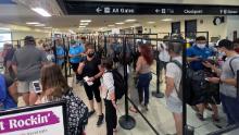 American Airlines customers seen stranded at Charlotte Airport after American Airlines cut 1 percent of its flights to alleviate pressure on operations due to labor shortage and increased travel on June 20, 2021 in Charlotte, North Carolina. 