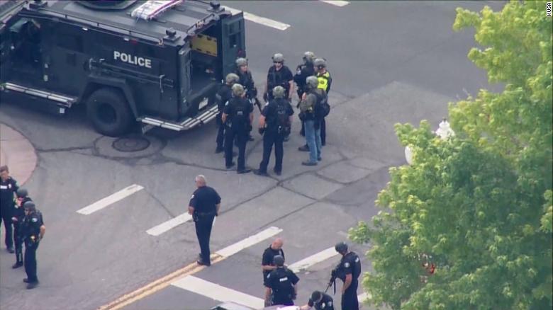 A Colorado police officer was among three people killed in a shooting in the city of Arvada
