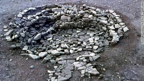 Objects including bone spoons, quernstones and gaming pieces were incorporated into the walls of this Iron Age roundhouse at Broxmouth, Scotland.