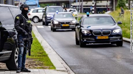 A secured transport arrives at the court in the Dutch city of Rotterdam on Tuesday ahead of Tse Chi Lop&#39;s hearing.