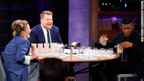 Drew Barrymore and John Boyega play &quot;Spill Your Guts or Fill Your Guts&quot; with James Corden during &quot;The Late Late Show with James Corden&quot; in 2018. 