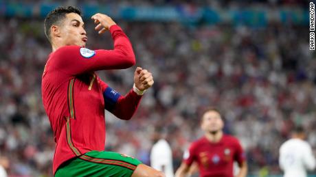 Ronaldo celebrates after scoring his team&#39;s first goal from the penalty spot.