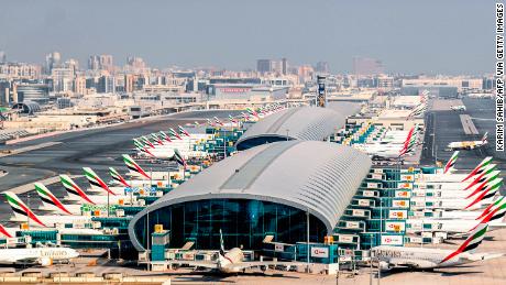 This picture taken on July 8, 2020 shows an aerial view of Emirates aircraft parked on the tarmac at Dubai International Airport (DXB), serving the Gulf emirate of Dubai, during a government-organised helicopter tour. (Photo by KARIM SAHIB / AFP) (Photo by KARIM SAHIB/AFP via Getty Images)