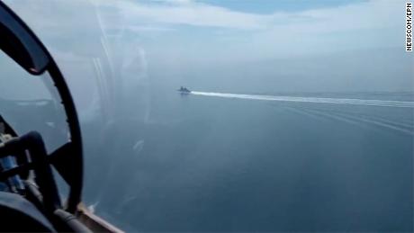 Image of Russian Black Sea Fleet and border patrol boat&#39;s prevention of the breach of the Russian state border committed by the UK Navy destroyer Defender on June 24, 2021. The Russian Defence Ministry said a border patrol boat fired the shots at HMS Defender after it entered the country&#39;s territorial waters in the Black Sea. It also said that a Su-24M warplane dropped four bombs close to the ship. Britain dismisses Russian claims, saying that the 152 metre-long, 8,500-tonne vessel was conducting innocent passage through Ukrainian territorial waters in accordance with international law. In a statement posted on Twitter, it said: We believe the Russians were undertaking a gunnery exercise in the Black Sea and provided the maritime community with prior warning of their activity. No shots were directed at HMS Defender and we do not recognise the claim that bombs were dropped in her path.&lt;0x0a&gt; (Newscom TagID: eyepress104890.jpg) [Photo via Newscom]