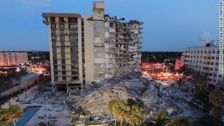 Little fingers and screaming led a dog walker to a boy trapped in Florida condo rubble