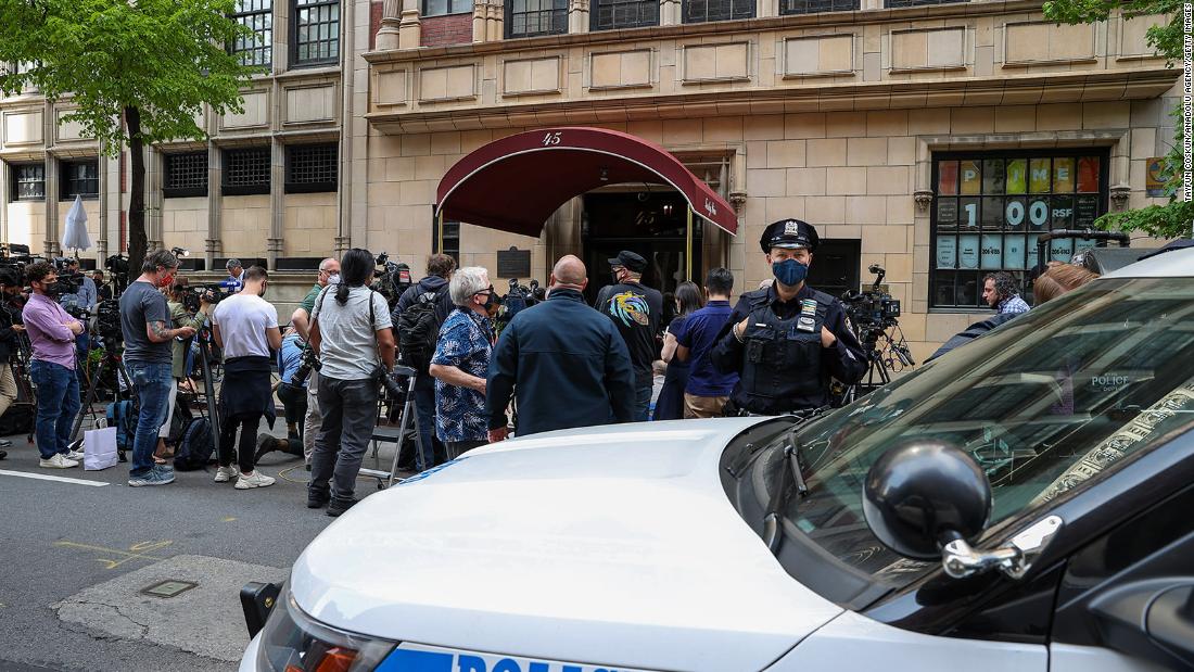 Members of the press gather outside Giuliani&#39;s apartment in New York in April 2021. Federal agents &lt;a href=&quot;https://www.cnn.com/2021/04/28/politics/rudy-giuliani-federal-prosecutors/index.html&quot; target=&quot;_blank&quot;&gt;executed search warrants&lt;/a&gt; at Giuliani&#39;s apartment and office, his attorney said, advancing a criminal investigation by federal prosecutors that has been underway for more than two years. Giuliani has been the focus of an investigation concerning his activities in Ukraine, including whether he conducted illegal lobbying for Ukrainian officials while he pursued an investigation linked to Trump&#39;s primary political rival, President Joe Biden, CNN has reported. Giuliani hasn&#39;t been charged, and he has denied wrongdoing.
